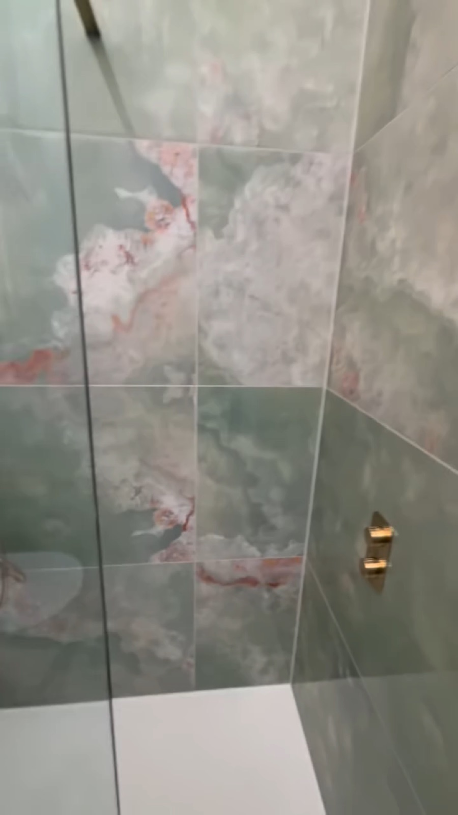 Arabic Jade shower room with bespoke tiling and fixtures